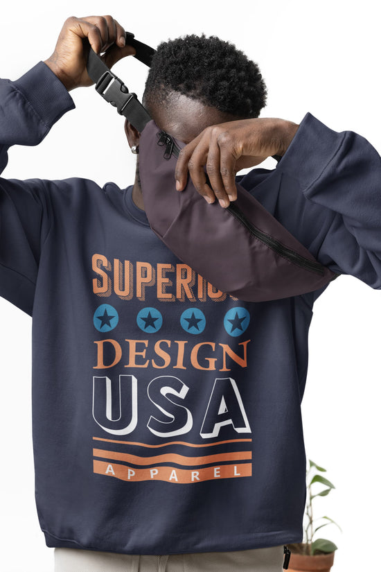 Person wearing a navy blue sweatshirt with &