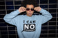 Person wearing a light blue sweatshirt with &