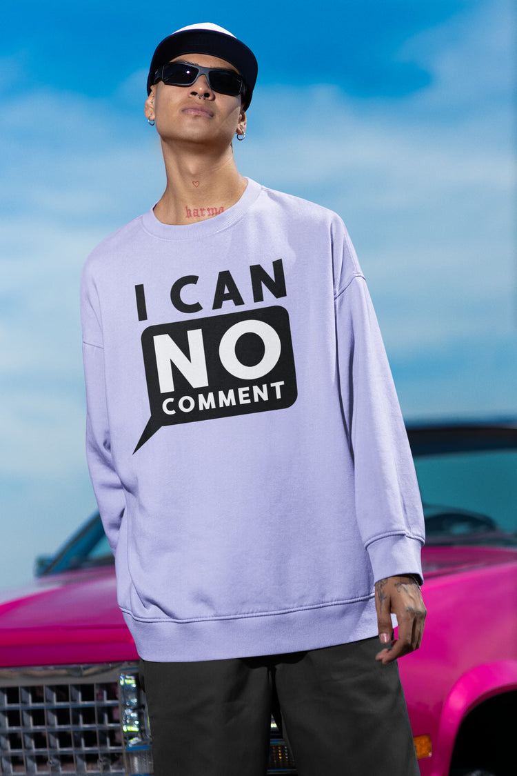 Person wearing a light purple sweatshirt with &