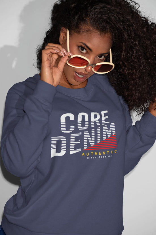Person wearing a navy blue sweatshirt with &