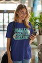 Woman wearing a blue t-shirt with &