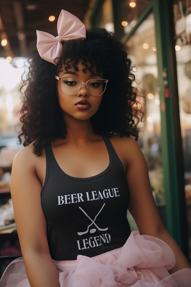 Woman wearing a black tank top with &