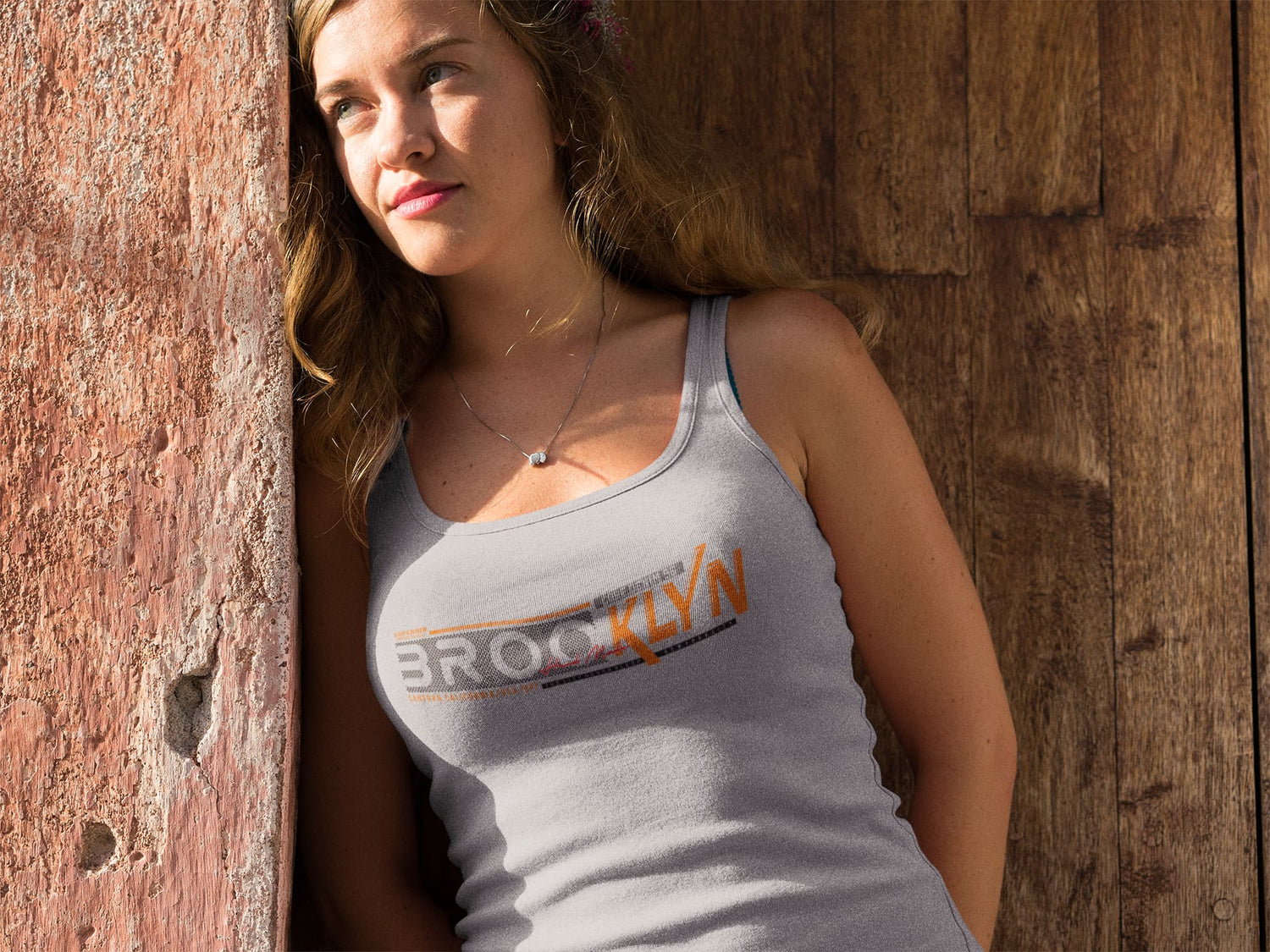 Woman wearing a tank top with &